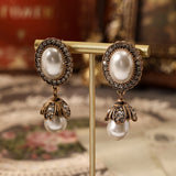 Brincos Pendentes com Moldura de Pérola Vintage