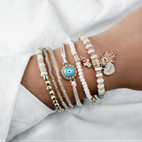 Conjunto de Pulseiras Hamsa Douradas Elegantes