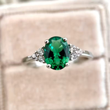 Anel de Promessa de Esmeralda e Zircónia Elegante