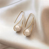 Brincos Místicos de Pérolas Elegantes